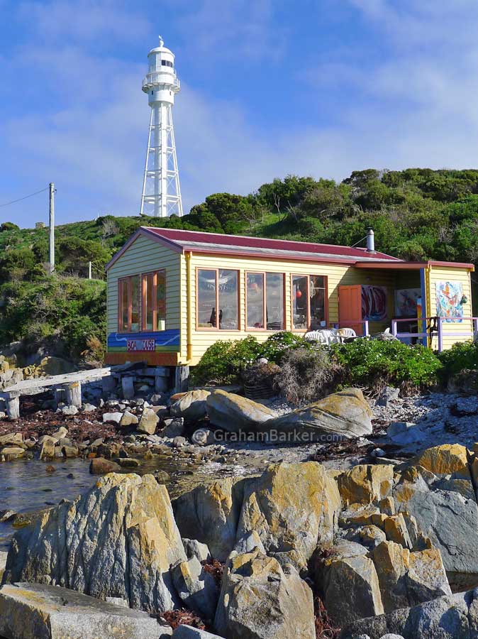 Boat House Restaurant (with no food) and Currie lighthouse, King Island