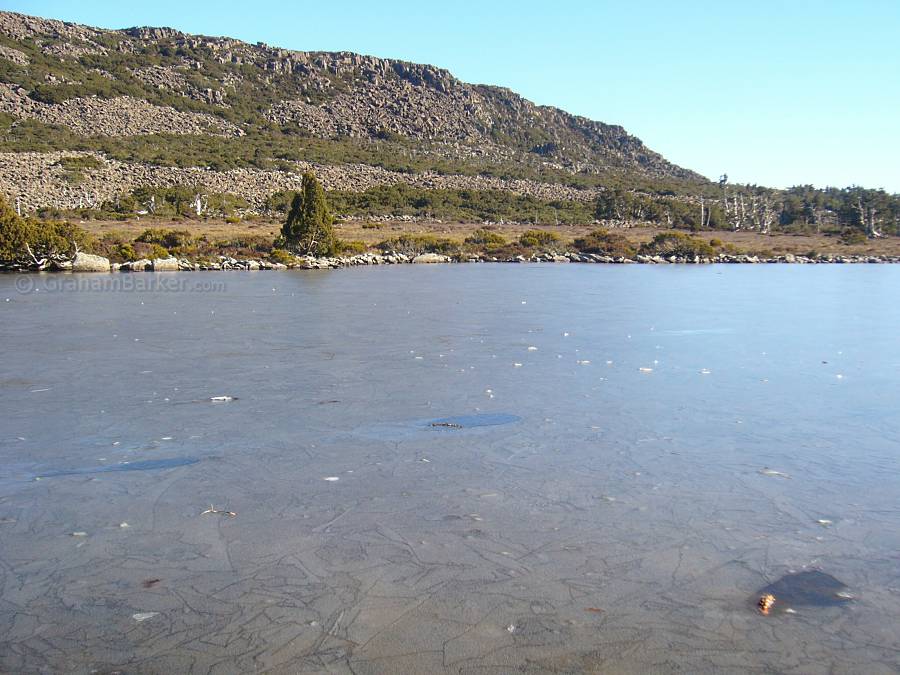 Lightly frozen lake surface, Pine Lake, Tasmania